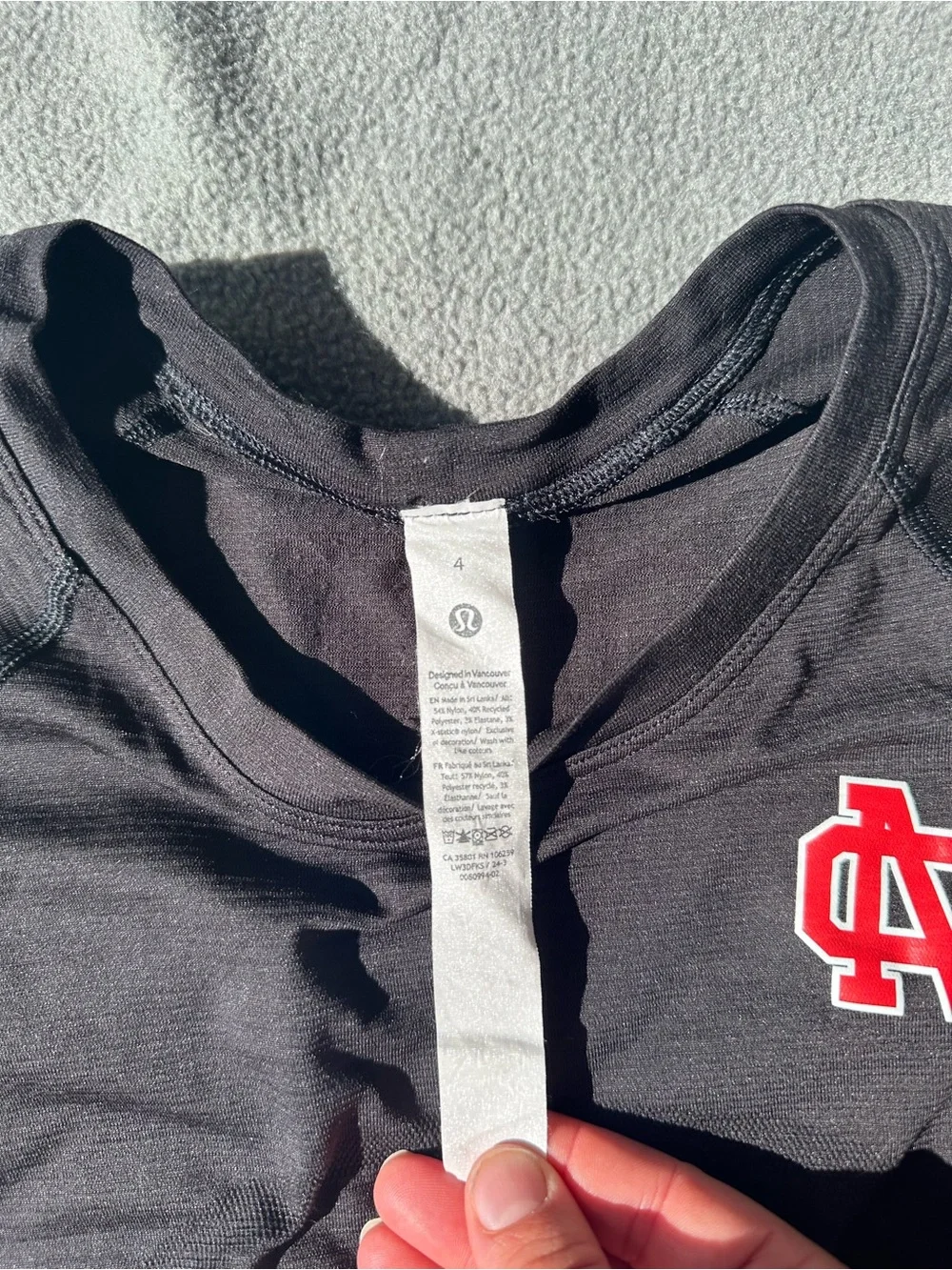 lululemon athletica Black Long Sleeve Top with Red NC Chest Logo